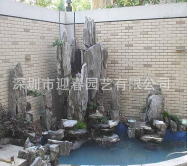 福建福州泉州假山公司制作黃臘石太湖石英石千層石吸水石塑石假山
